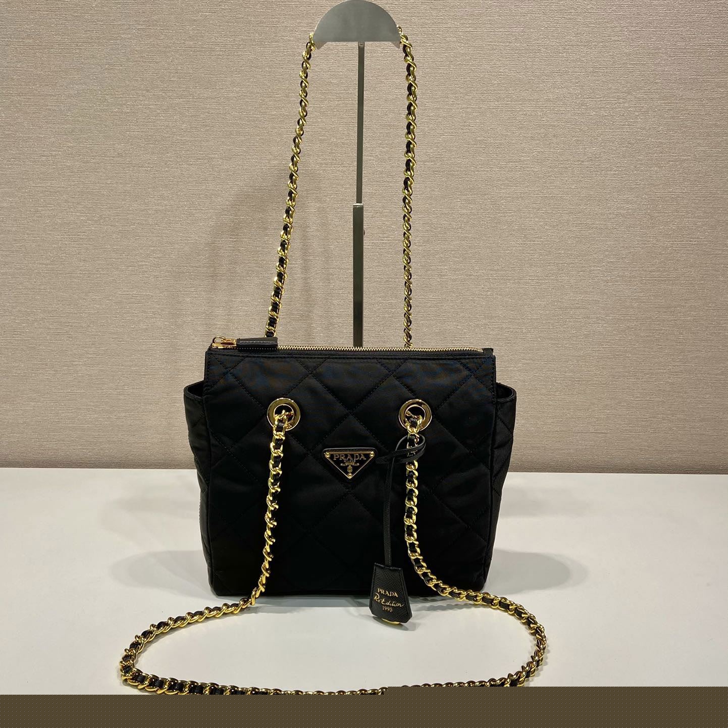 Pra*a top handle bags